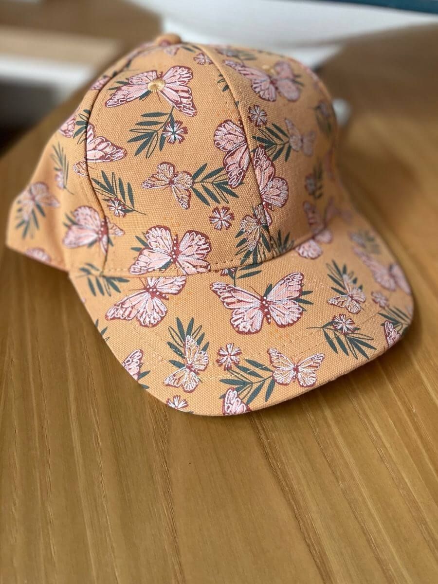 Visera Mariposas Crema